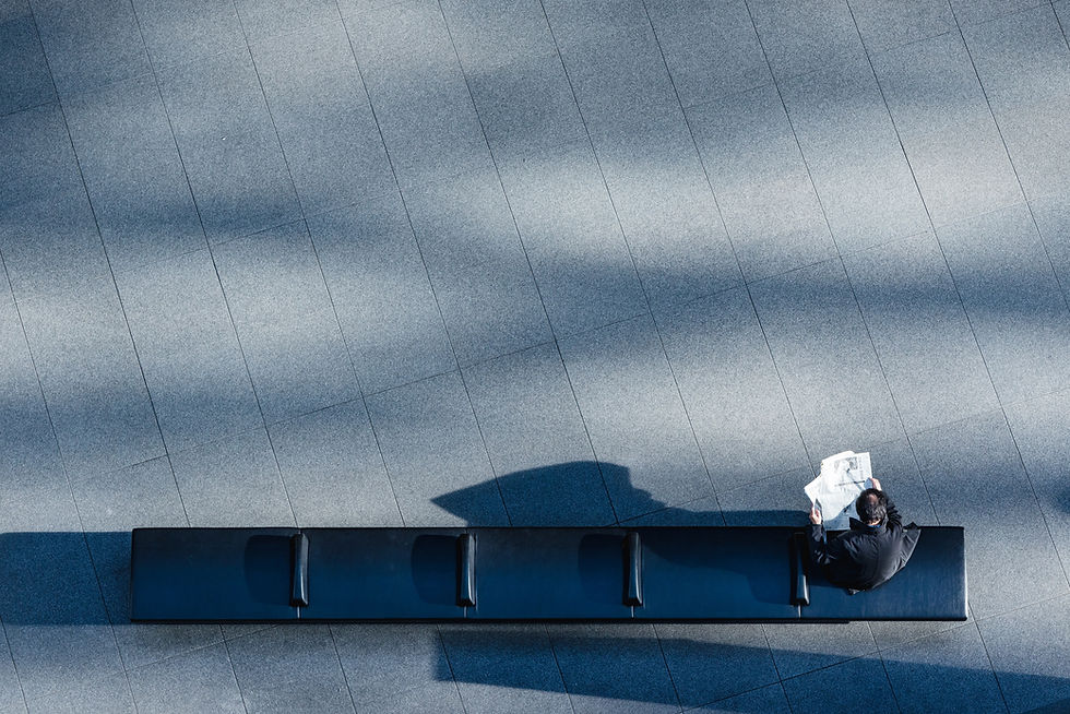 Man Reading the Newspaper
